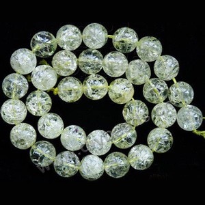 Bead, ice flake quartz (heated/dyed), yellow, 8mm round. Sold per 16-inch strand