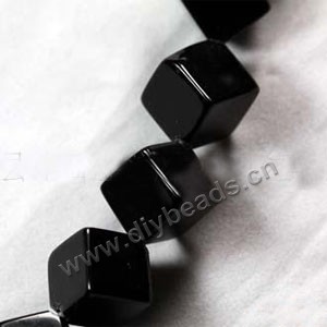 Bead, black agate (dyed), 12x12mm dice. Sold per 16-inch strand.