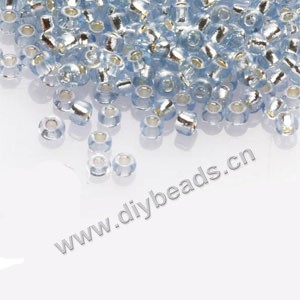#11 seed beads,glass,light blue,silver-lined,irregular round.sold per pkg of 1/2 kilo.