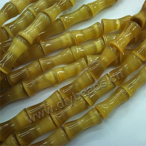 Bead, cat's eye glass, yellow,20x10mm bamboo. Sold per 15-inch strand.