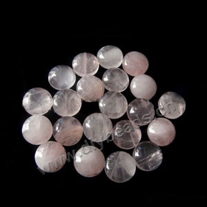 Cabochon, rose quartz (natural), 10mm round, Mohs hardness 7. Sold per pkg of 200.