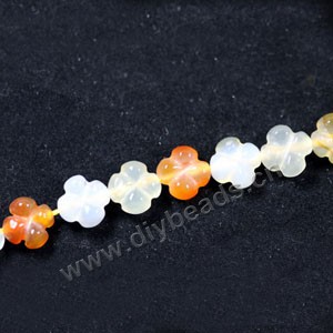 Bead, red agate (heated), 20mm carved flower,  Sold per 16-inch strand.