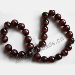 Bead, cat's eye glass,purple, 12mm round, quality grade. Sold per 14.5-inch strand.
