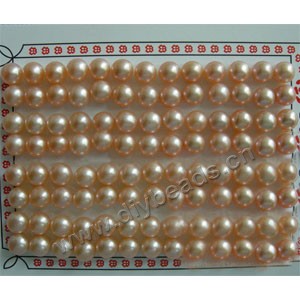 Pearl, cultured freshwater , peach, 6.5-7mm half-drilled button, AAA grade.Sold per pkg of 80 pairs