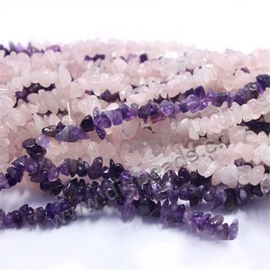 Bead,quartz crystal (natural), medium chip. Sold per 34-inch strand.