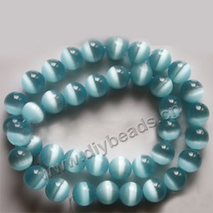 Bead, cat's eye glass,blue sky, 10mm round, quality grade. Sold per 14.5-inch strand.
