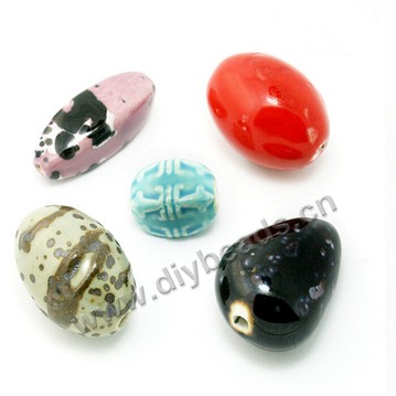 Bead , fancy glaze porcelain , 24x34mm  special-shaped. Sold per pkg of 50 beads. 