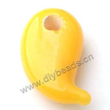 Bead,lampworked glass,yellow yin-yang beads. 10*19mm. Sold per pkg of 5.