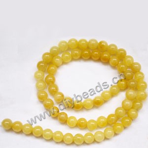 Bead, yellow "jade" (natural), 6mm round. Sold per 15-inch strand