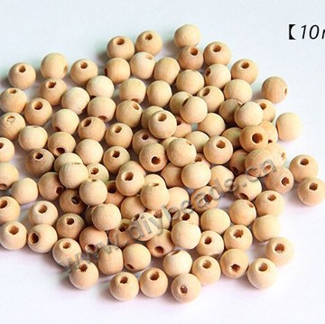 Beads,wood,round loose beads,12mm with 3mm hole. Sold per pkg of 1000ps