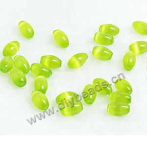 Bead, cat's eye glass,lime green,12x8mm oval. Sold per strands, approximately 33 beads .
