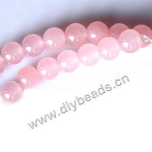 Bead, pink jasper (dyed), 8mm round. Sold per 15-inch strand