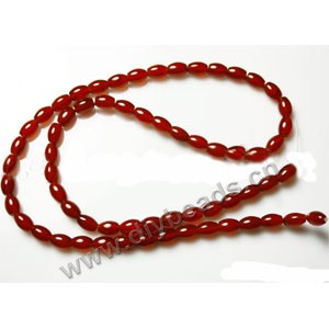 Bead, dark red agate (dyed), 6x4mm oval. Sold per 15-inch strand.