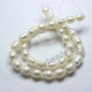 Pearl, cultured freshwater (natural), white, 8-9mm rice,C grade. Sold per 14-1/2 inch strand