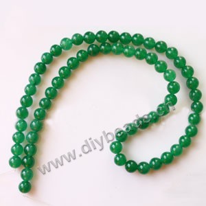 Bead, Malaysia "jade" (dyed), green, 6mm round, Mohs hardness 7. Sold per 15-inch strand