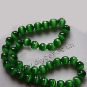 Bead, cat's eye glass,green, 10mm round, quality grade. Sold (10) 14.5-inch strands.