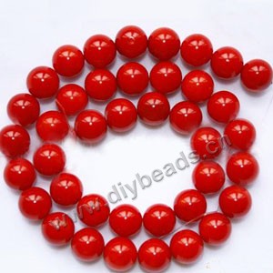 Bead, red coral (imitation), 10mm round. Sold per 15-inch strand.