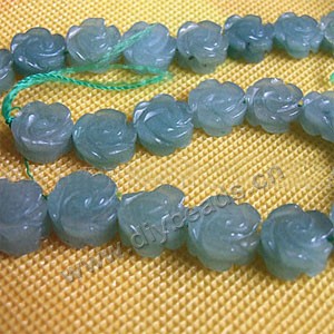 Bead, blue aventurine (natural), 10mm carved flower. Sold per 15-inch strand