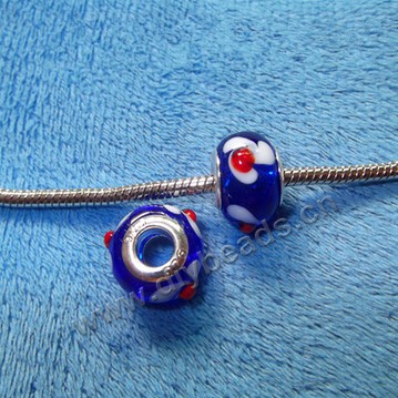beads,glass,large hole beads blue, 10x14mm. Sold per pkg of 100ps