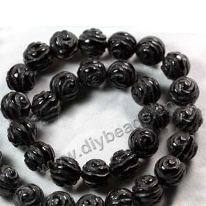 Bead, black agate (dyed),10mm carved double side flower. Sold per 16-inch strand.