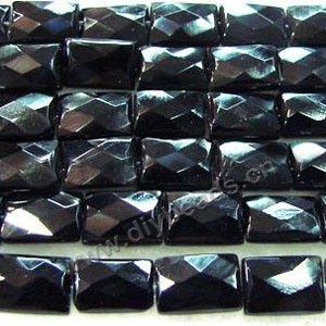 Bead, black agate (dyed), 12x18mm faceted rectangle. Sold per 16-inch strand.
