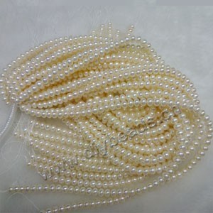 Pearl, cultured freshwater ,white ,8mm potato,A grade. Sold per pkg of (5) 15-inch strands.