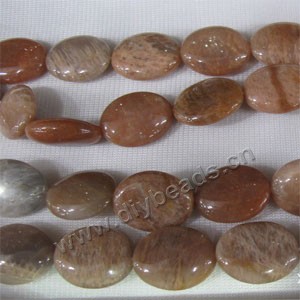 Bead, sunstone (natural), 15x19mm puffed oval. Sold per 16-inch strand