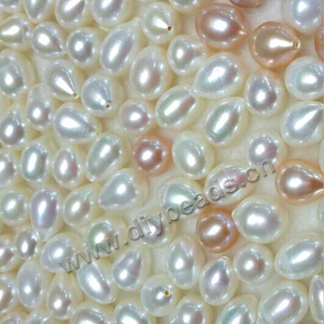   Pearl  rice shape pearl , cultured freshwater,  teardrop pearl with hole   white, 9---10mm. Sold by pcs