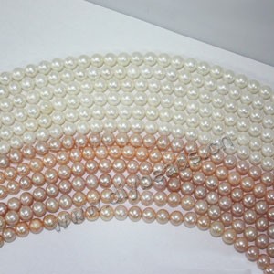 Pearl,cultured freshwater (natural), white/peach/mauve, 5-6mm nearly round, B grade. Sold per pkg of (3)16-inch strands.
