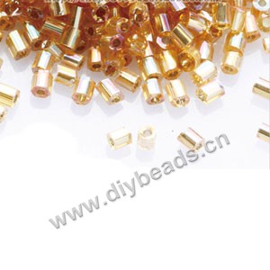Bugle bead,taiwan, glass, silver-lined  rainbow gold,#1(2x2mm) hex beads. Sold per pkg of 500 grams,approximately 40,000ps 