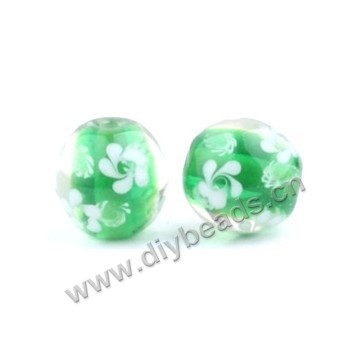 Bead, lampworked glass,green with flower, 16x16mm round.mini order 50pc 