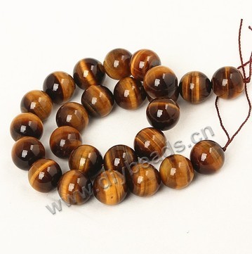 Bead, tigereye (natural), 10mm round. Sold per 16-inch strand