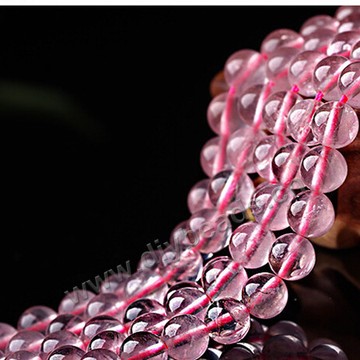 Bead,rose quartz,  14 mm round . Sold by strands