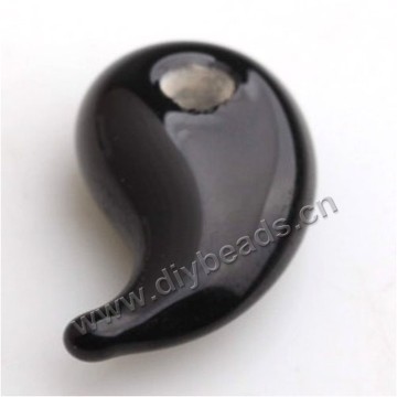 Bead,lampworked glass,black yin-yang. 10*19mm. Sold per pkg of 5.