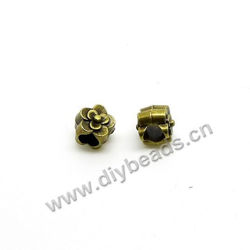 Bead, big-hole beads,alloy flower,9.5x8.5x9mm,5mm hole. Sold per pkg of 500ps