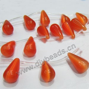 Bead, cat's eye glass,  red, 11x22mm top-drilled teardrop. Sold per 15-inch strand.
