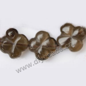 Bead, smoky quartz (heated/irradiated), 10mm carved flower. Sold per 15-inch strand.