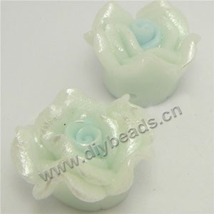 Bead, polymer clay, ivory with light blue,pearl luster, 20mm rose. Sold per pkg of 12.