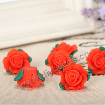 Bead, polymer clay,red,23x12mm flower. Sold per pkg of 20.