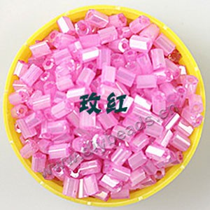 Bugle bead, glass,silky luster,fuchsia,#1 (3x2mm)beads. Sold per pkg of 80 grams,approximately 4,500ps.