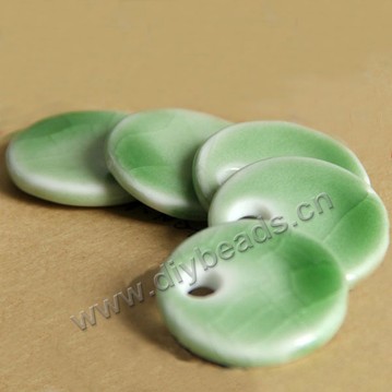 Bead, porcelain, green,27*14mm wafer. Sold per pkg of 20piece. 