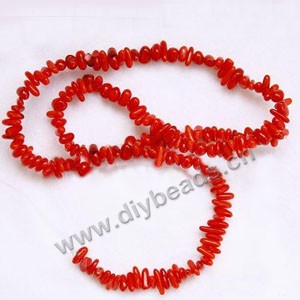 Bead, red coral (imitation), small chip. Sold per 15-inch strand.