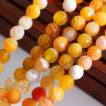 Beads, striped agate, yellow color, 6mm faceted round. Sold per pkg of 10 strands
