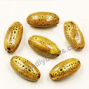 Bead, fancy glaze porcelain, yellow, 27x12mm long oval. Sold per pkg of 30 beads 
