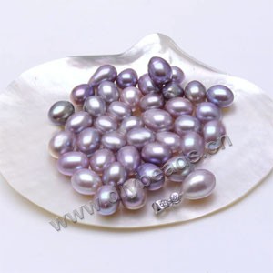 Pearl, cultured freshwater , mauve, 9-10mm half-drilled rice, AAA grade. Sold per pkg of 1parirs