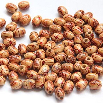 Beads,wood,round loose bead,7x10mm with 3mm hole. Sold per pkg of 100ps