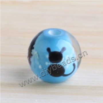 Bead, lampworked glass,blue with animal, 14x14mm round.mini order 50pc 