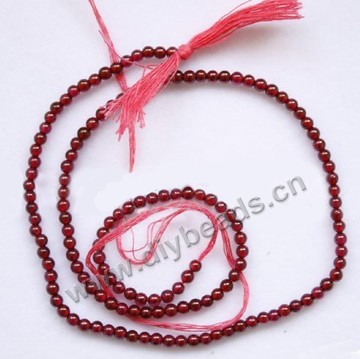 Bead, garnet (natural),wine, 4mm round, A- grade, Mohs hardness 7 to 7-1/2. Sold per 15-inch strand
