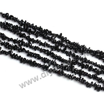 Bead, black tourmaline, 4x7mm chips. Sold per pkg of ten 16-inch strands.