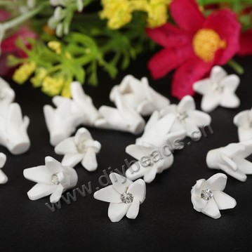 Bead, polymer clay,white with rhinestone,10x12mm flower. Sold per pkg of 5.